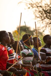 Photograph taken during a cultural dance presentation in the Karamojong region