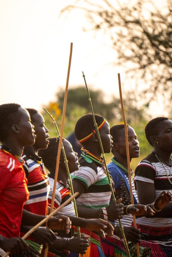 Photograph taken during a cultural dance presentation in the Karamojong region