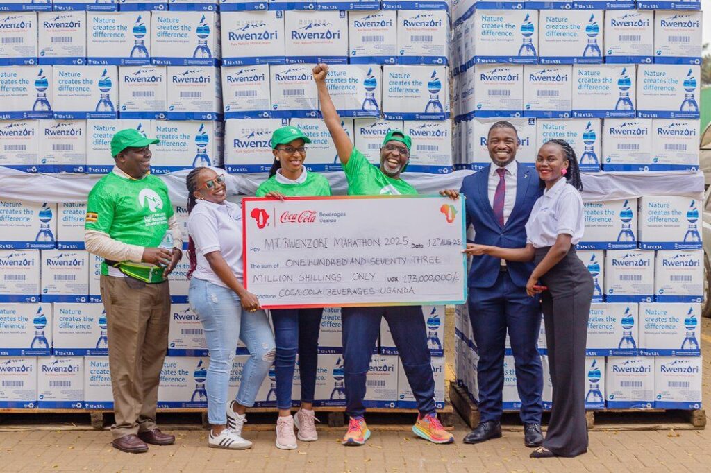 On August 12th, 2025, Coca-Cola Beverages Uganda, in collaboration with Rwenzori Beverages, handed over a symbolic cheque of UGX 175 million to the Rwenzori Marathon team, led by organizer Amos Wekesa