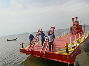 Photograph of the "The Barge," a custom-built flat-bottomed vessel designed to streamline logistics for its crown jewel, Paradise Island Resort