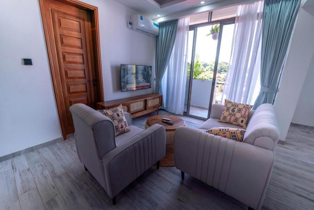 Living area Photo The Mist Hotel Entebbe Central Region