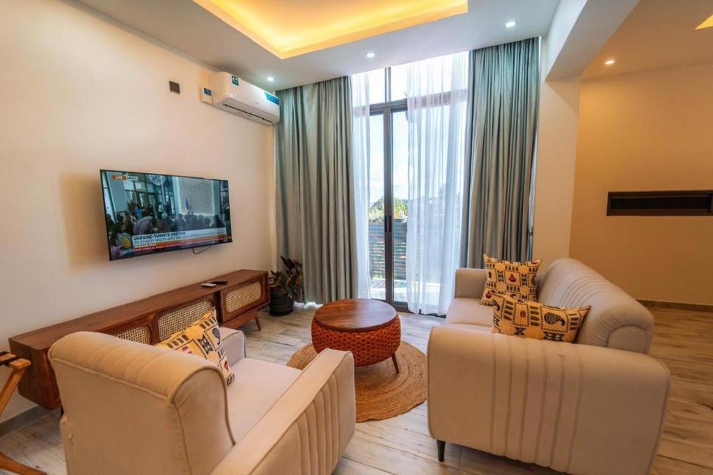Living area Photo The Mist Hotel Entebbe Central Region 1