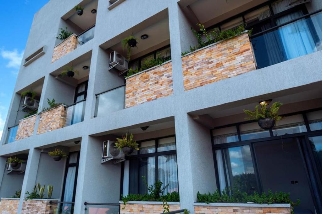 Property Exterior Photo The Mist Hotel Entebbe Central Region