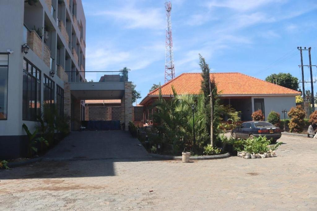 Property Exterior Photo The Mist Hotel Entebbe Central Region 1