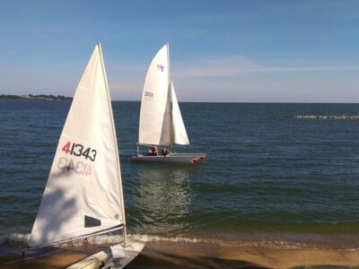 Photograph of a pair of sailboats taken from Entebbe Sailing Club in Entebbe, Uganda