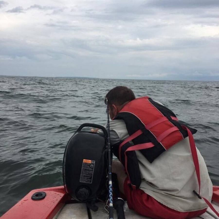 Photograph taken during a fishing competition at Entebbe Sailing Club in Entebbe, Uganda