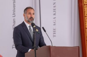 Photograph of His Highness The Aga Khan giving a speech at the inauguration ceremony of the Aga Khan University in Kampala