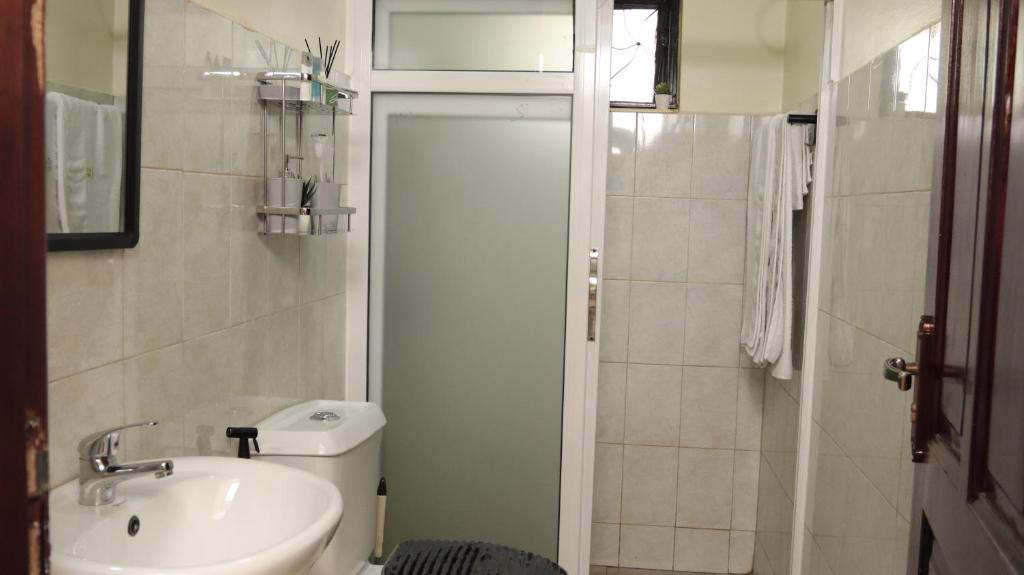 Bathroom Photo Premier Suites Aparthotel Kyanja Kampala Central Region