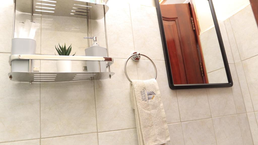 Bathroom Photo Premier Suites Aparthotel Kyanja Kampala Central Region 1