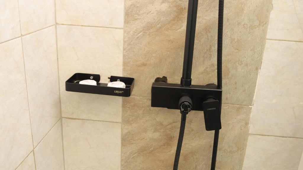 Bathroom Photo Premier Suites Aparthotel Kyanja Kampala Central Region 2