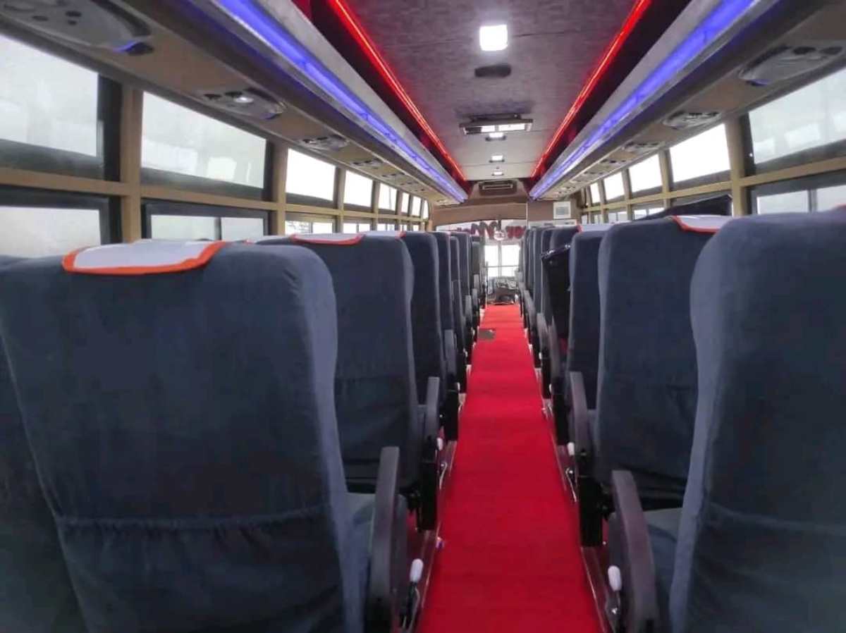 Photograph showing the interior of one of the Super Metro buses in Namayiba Bus Park, Kampala
