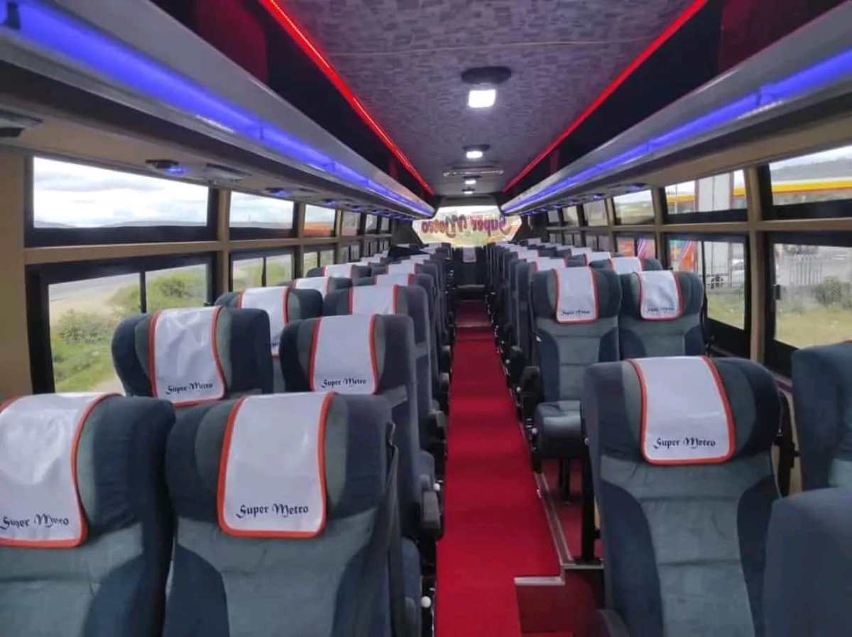 Photograph showing the interior of one of the Super Metro buses in Namayiba Bus Park, Kampala