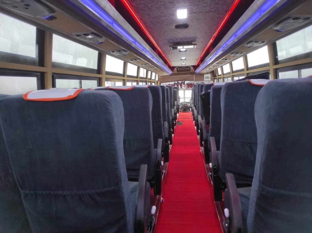 Photograph showing the interior of one of the Super Metro buses in Namayiba Bus Park, Kampala