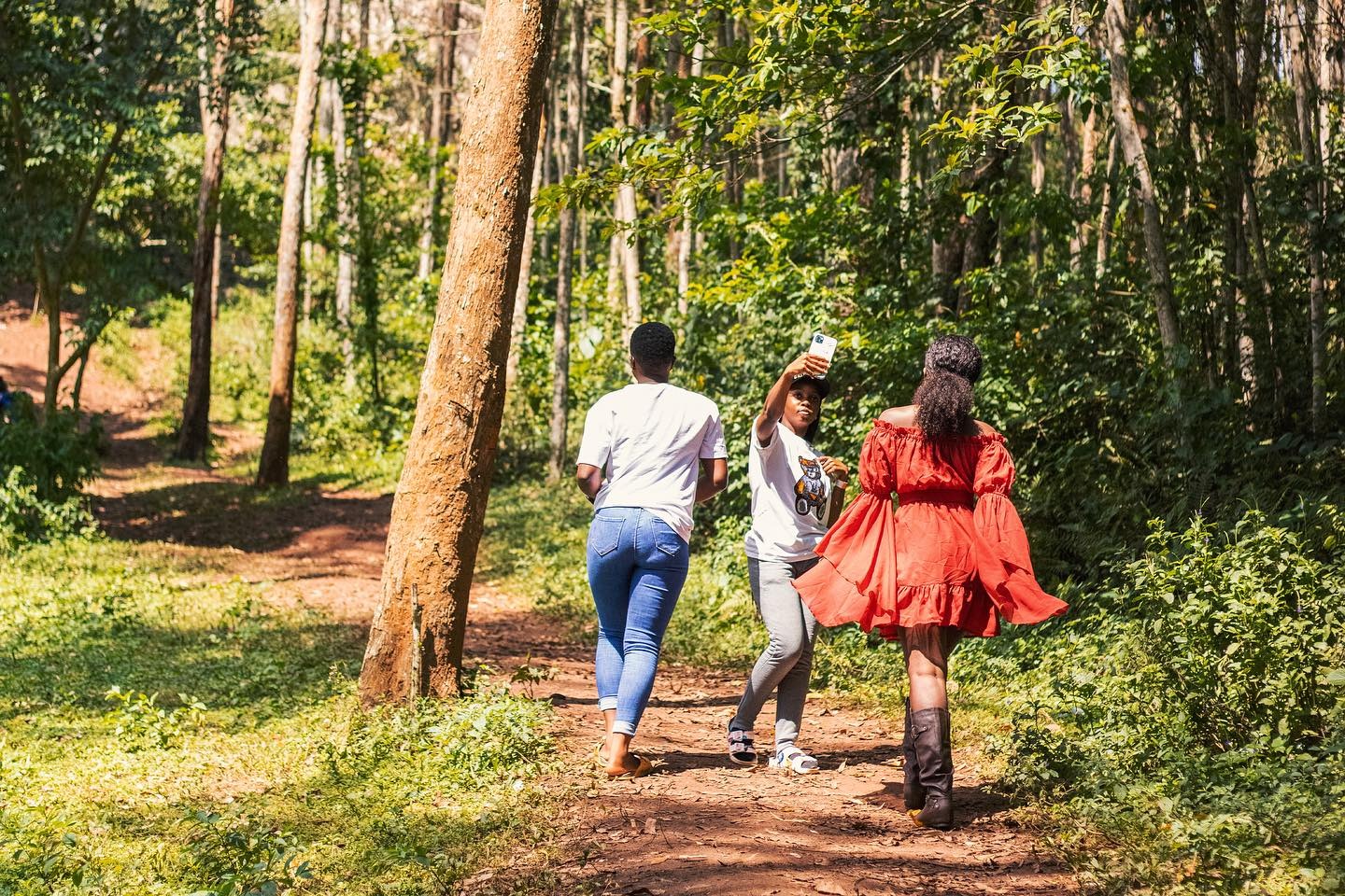 Young Uganda youth in Ssezibwa Falls Forest Walk Trail with Ssezibwa Forest in the background. Photography by Ssezibwa Falls Resort Mukono Uganda