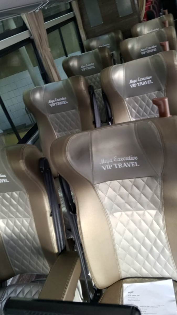 Photograph showing the interior of one of the Mega Executive Buses in Kampala, Uganda