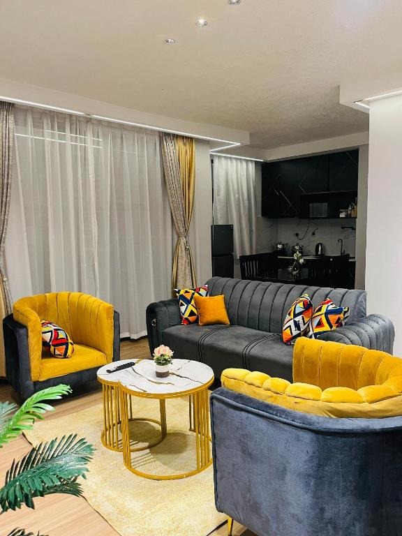 Living area Photo Elyon Nest Hotel Kampala Central Region