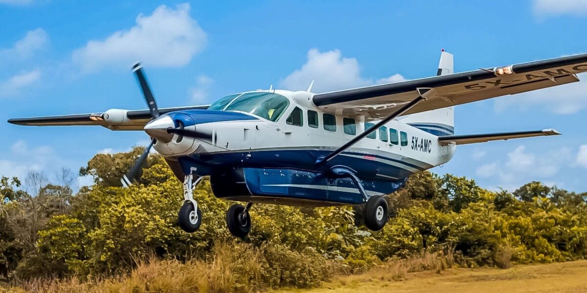 Asante Aviation's Cessna 208 Grand Caravan (5X-AMC) in action, delivering swift and scenic charter flights to remote destinations across East Africa