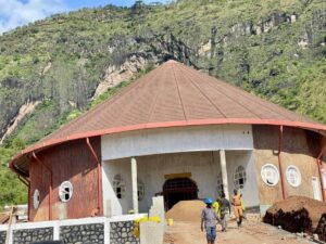 Workers put finishing touches on the main exhibition building of the Karamoja Museum