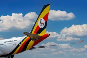 A Uganda Airlines jet displays the country’s iconic crane symbol amid plans to expand routes and improve travel connectivity