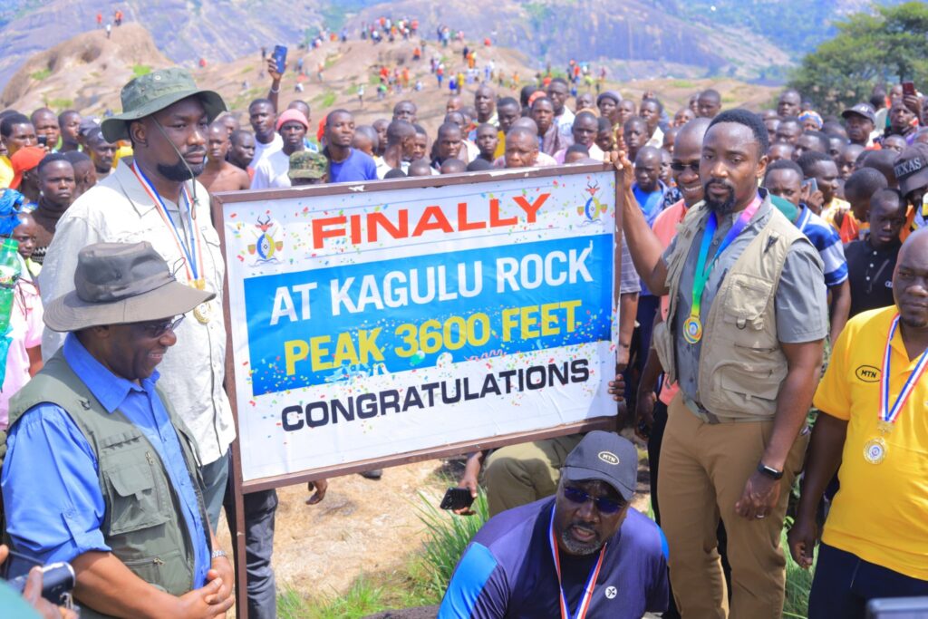 Hikers and William Wilberforce Gabula Nadiope IV at the summit of Kagulu Rock during the Kagulu Rock Climbing Challenge