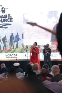 Keynote speaker addresses the audience during the national premiere of "Back to the Source: The Nile" in Kampala