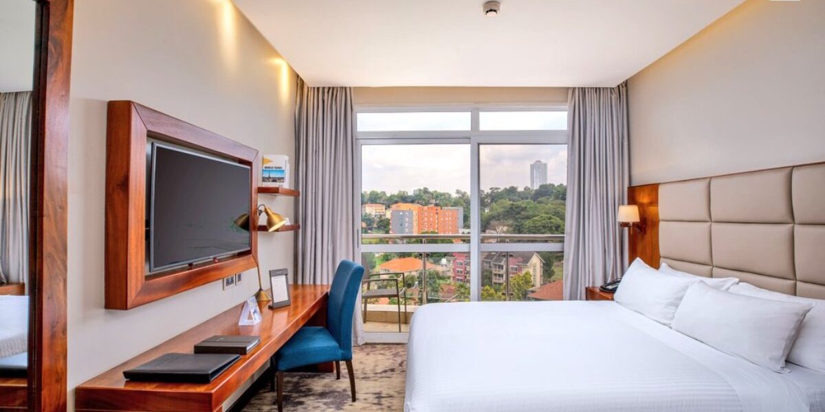 Spacious deluxe room at Golden Tulip Kampala overlooking the scenic Kampala hills, one of the highlights praised by guests in the TripAdvisor Travellers’ Choice Award 2026