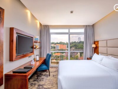 Spacious deluxe room at Golden Tulip Kampala overlooking the scenic Kampala hills, one of the highlights praised by guests in the TripAdvisor Travellers’ Choice Award 2026
