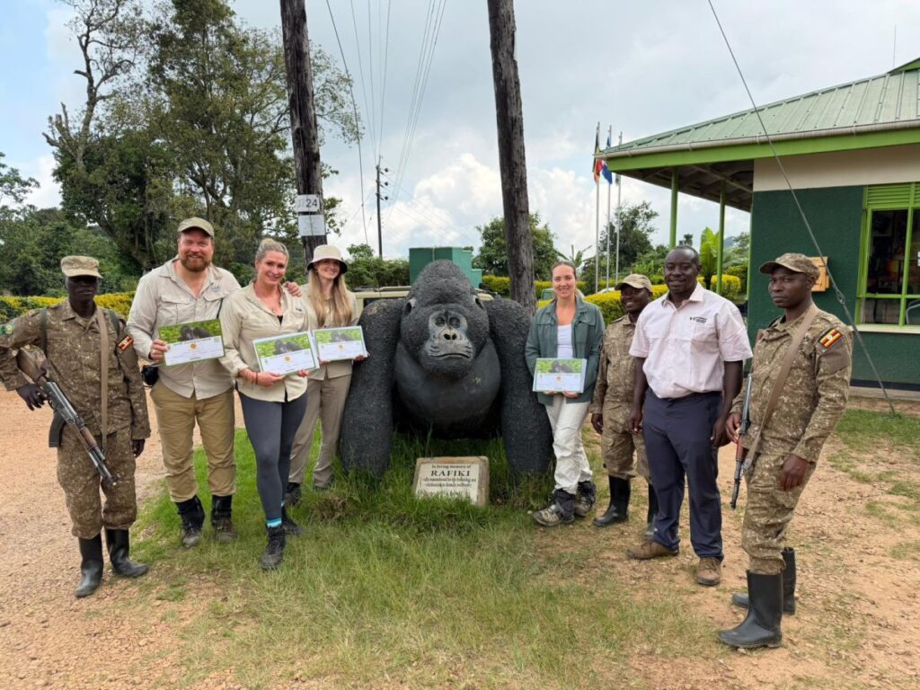 Australian tourism professionals and media delegates pose with certificates after completing their gorilla trekking experience during the 10-day Familiarization Tour in Uganda