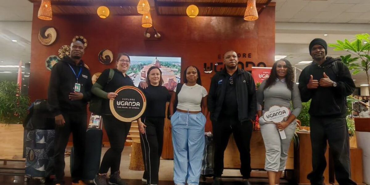Southern African travel agents and buyers proudly pose with 'Explore Uganda' branding upon arrival in Uganda for the pre-Pearl of Africa Tourism Expo 2026 familiarization trip