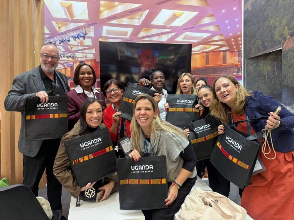 Members of the Uganda delegation proudly display Uganda Convention Bureau merchandise at IMEX Frankfurt 2026