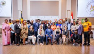 Group photo of dignitaries and partners at the Uganda Tourism Bus Launch, Ottawa, June 2026