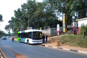 The pioneering E-Bus Xpress electric bus parked at Kololo Senior Secondary School, marking the debut of Uganda’s innovative cashless school mobility initiative