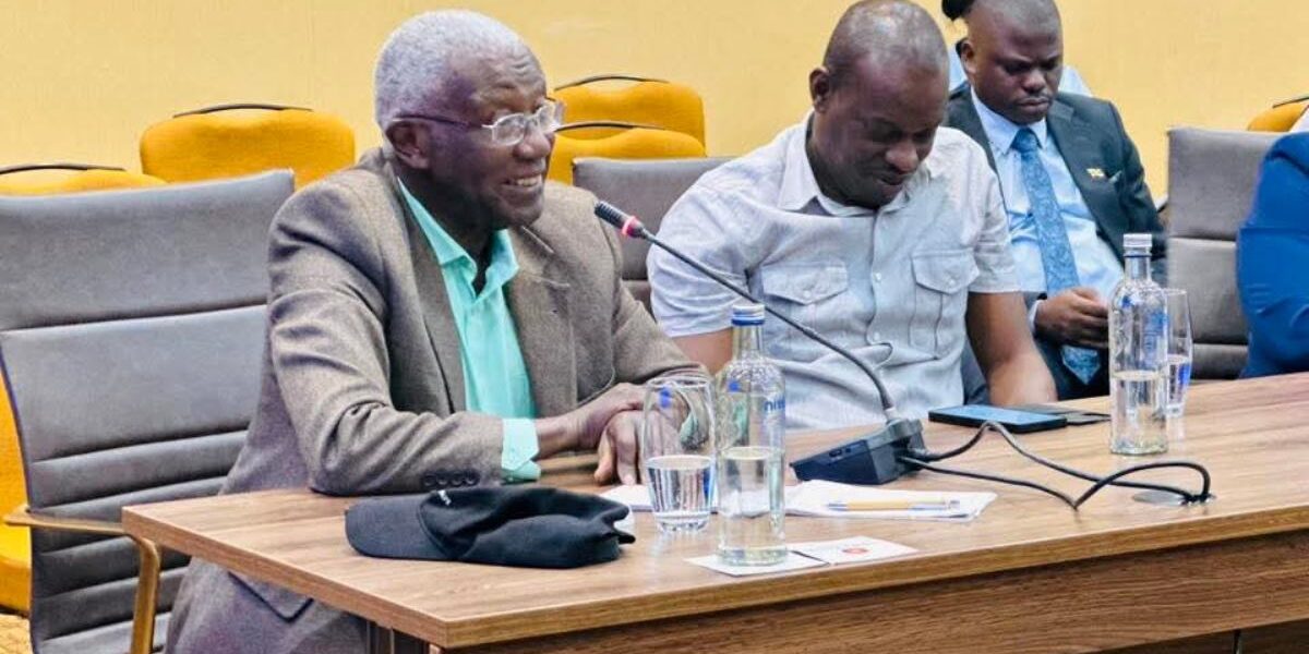 Hon. Col. (Rtd) Tom R. Butime, Minister for Tourism, Wildlife and Antiquities (left), engages during the high-level preparations review for the Pearl of Africa Tourism Expo 2026