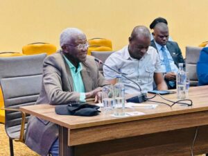 Hon. Col. (Rtd) Tom R. Butime, Minister for Tourism, Wildlife and Antiquities (left), engages during the high-level preparations review for the Pearl of Africa Tourism Expo 2026