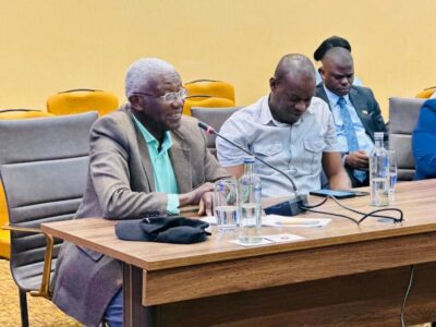 Hon. Col. (Rtd) Tom R. Butime, Minister for Tourism, Wildlife and Antiquities (left), engages during the high-level preparations review for the Pearl of Africa Tourism Expo 2026