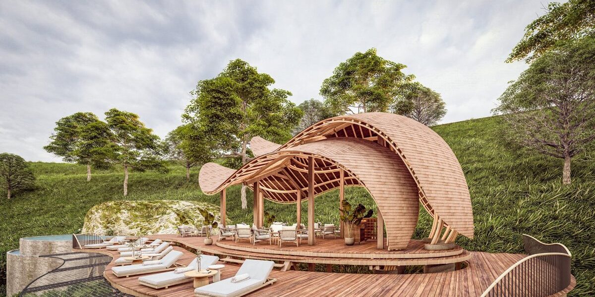 Relaxation area at Erebero Hills Lodge featuring a sculptural wooden deck with sun loungers and shaded pavilion, perfectly positioned to soak in the misty beauty of Uganda’s Bwindi Impenetrable Forest
