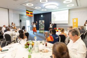 Traditional Ugandan performers showcase vibrant cultural dances to an engaged audience during the Uganda-Germany Tourism Roadshow in Düsseldorf on 23rd June 2026