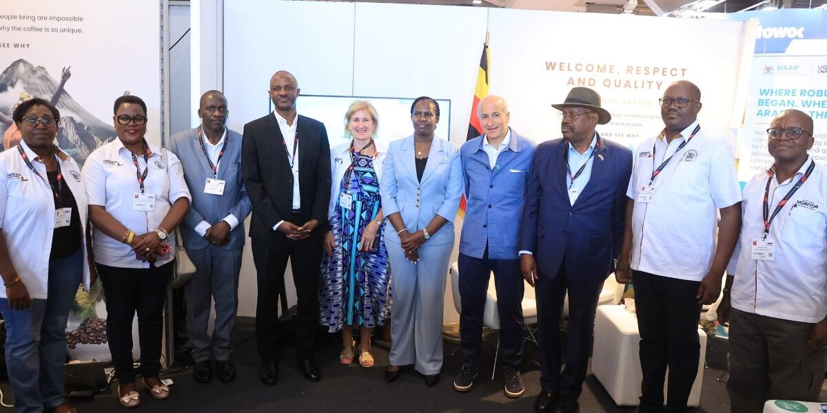 Ugandan officials and dignitaries pose for a commemorative photo at the successful launch of Uganda’s first national coffee brand at World of Coffee Brussels 2026