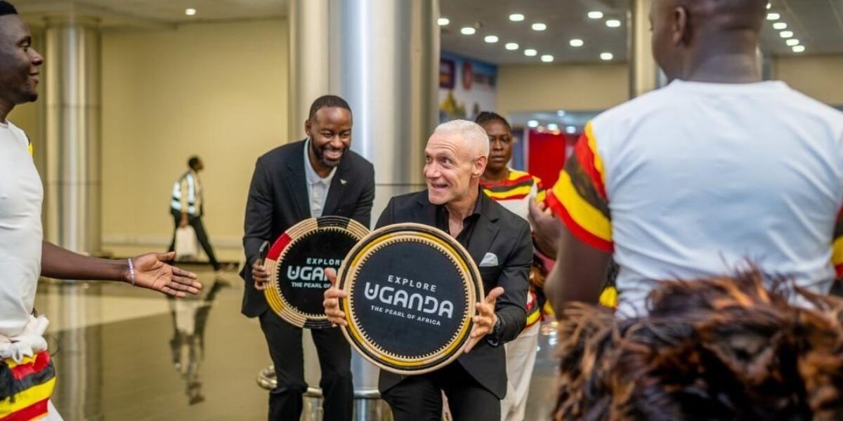 Roc Nation delegation members receive symbolic 'Explore Uganda – The Pearl of Africa' drums as part of the warm traditional welcome at Entebbe International Airport ahead of AFCON 2027 preparations