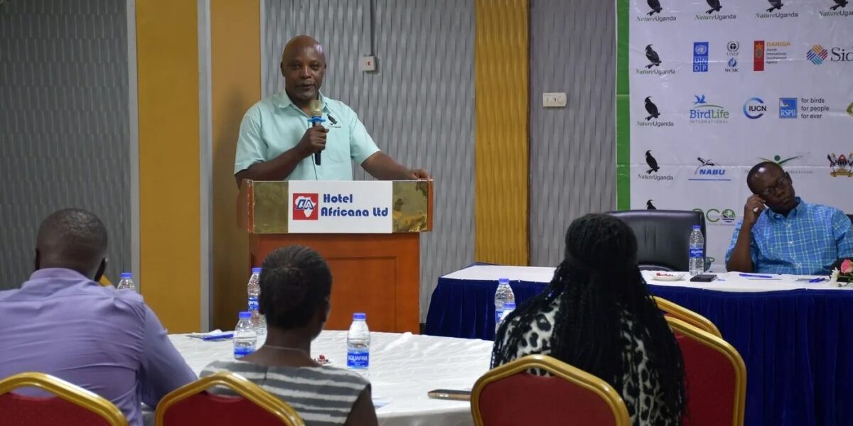 A speaker addresses delegates during Nature Uganda’s Annual General Meeting at Hotel Africana, highlighting key conservation achievements and future priorities for Uganda’s biodiversity