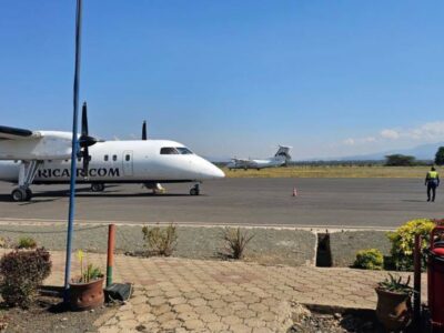 Auric Air aircraft on the tarmac at a Tanzanian airstrip, supporting the airline’s expanding network of scheduled safari and regional flights
