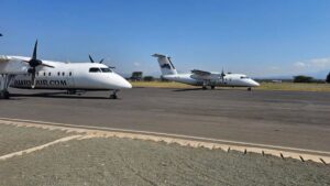 Two Auric Air regional aircraft parked at a Tanzanian Airstrip, supporting the airline’s new daily connections to Lake Natron