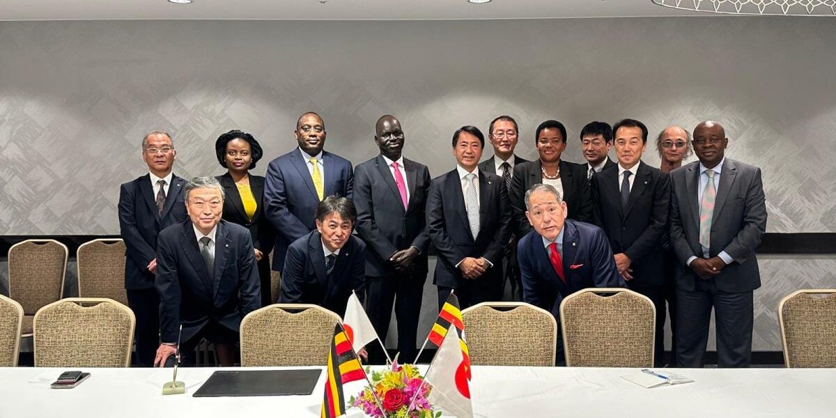 Ugandan and Japanese officials pose for a group photograph following the signing of the civil works contract for the New Karuma Bridge in Tokyo. The project is financed through Japan’s Official Development Assistance and will enhance connectivity along the Kampala–Gulu corridor
