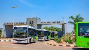 Kayoola Electric Buses exit the Kiira Vehicle Plant under clear skies on 28 August 2026, ahead of their official commissioning and deployment on new public transport routes in Kira Municipality and the Kampala metropolitan area
