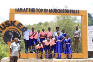 Group photo of school children and their teachers taken at the Top of the Murchison Falls in Murchison Falls National Park