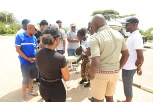 Visitors take part in a traditional Equator water demonstration at Kikorongo, one of the popular experiences associated with Uganda’s Equator tourism