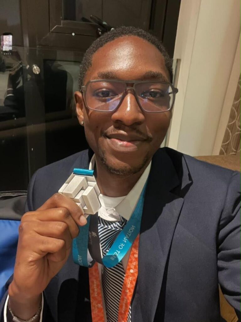 Paul Terran Lugobe, showing off his Medal of Excellence in Culinary Arts that he won at the 48th WorldSkills Competition held in Shanghai, China