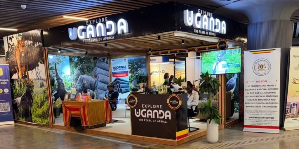 Uganda’s professional exhibition booth at the 12th ExpoBéton RDC in Kinshasa highlights the country’s rich biodiversity through striking wildlife photography while the Embassy of Uganda banner underscores official support for bilateral economic and tourism ties